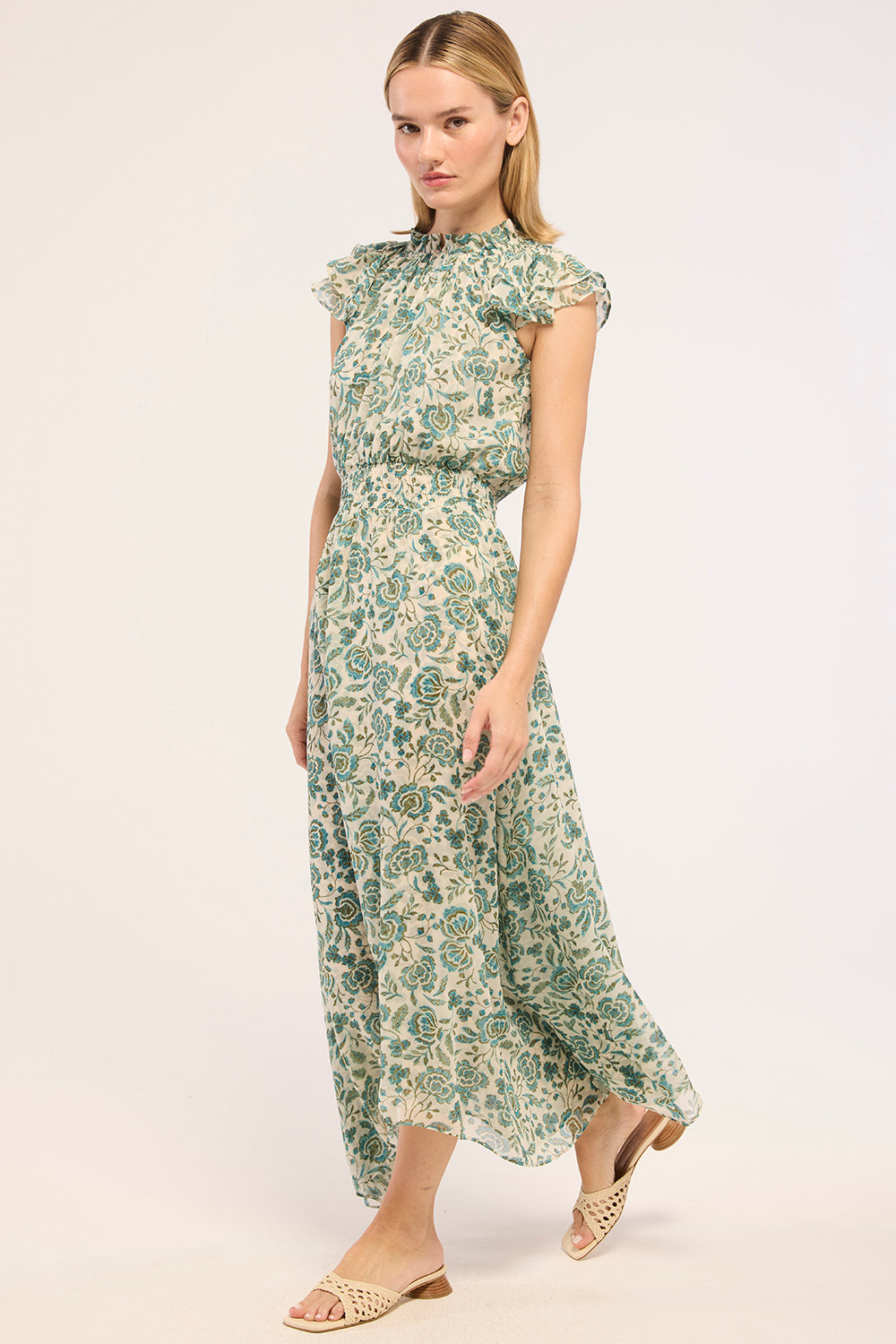 mariposa floral lace bodice dress Three looks, one gown.  MARIPOSA is all about the details: bold sheer  stripes that sculpt the body, hand-beaded lace that catches the light, and  layers that transform with every change. Add